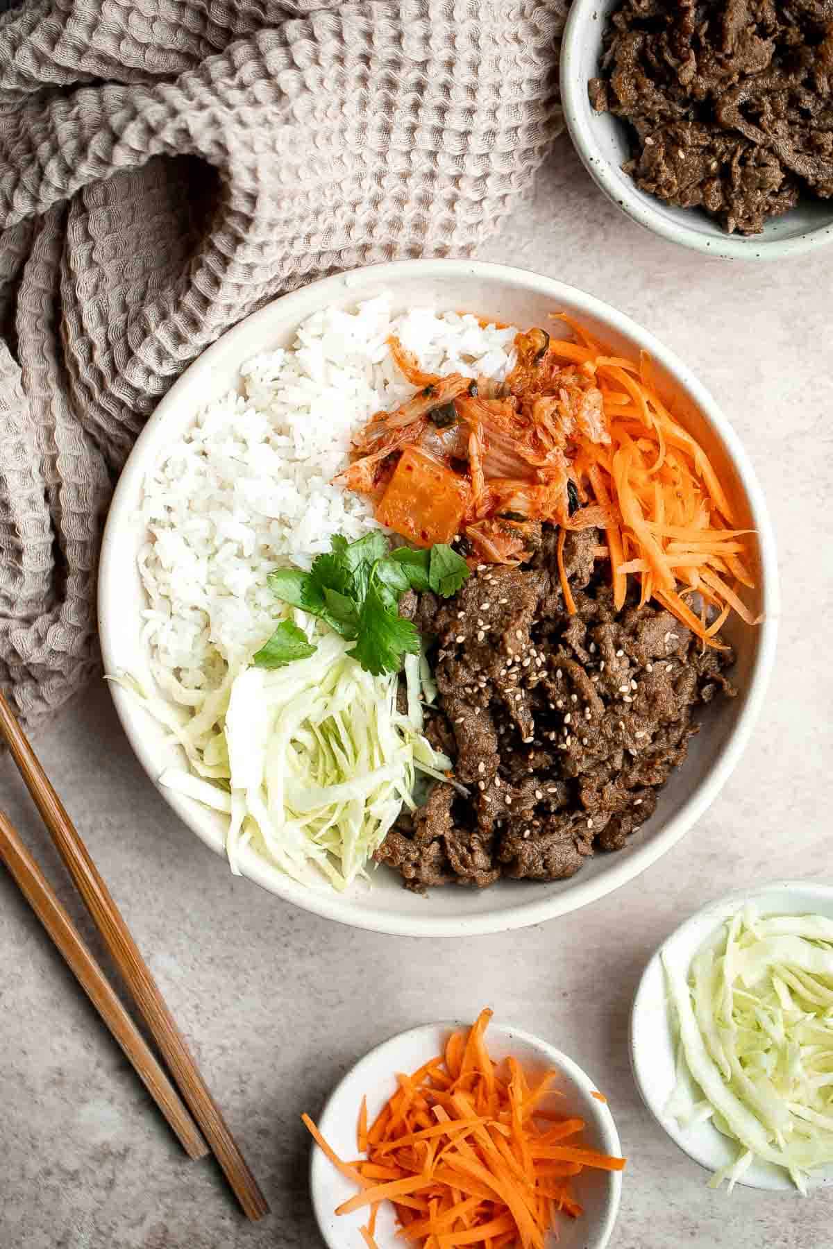 Korean Beef Bulgogi is a tasty, quick and easy 30-minute meal made with thinly sliced beef marinated in a delicious sweet and savory garlic soy sauce. | aheadofthyme.com