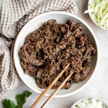 Korean Beef Bulgogi is a tasty, quick and easy 30-minute meal made with thinly sliced beef marinated in a delicious sweet and savory garlic soy sauce. | aheadofthyme.com