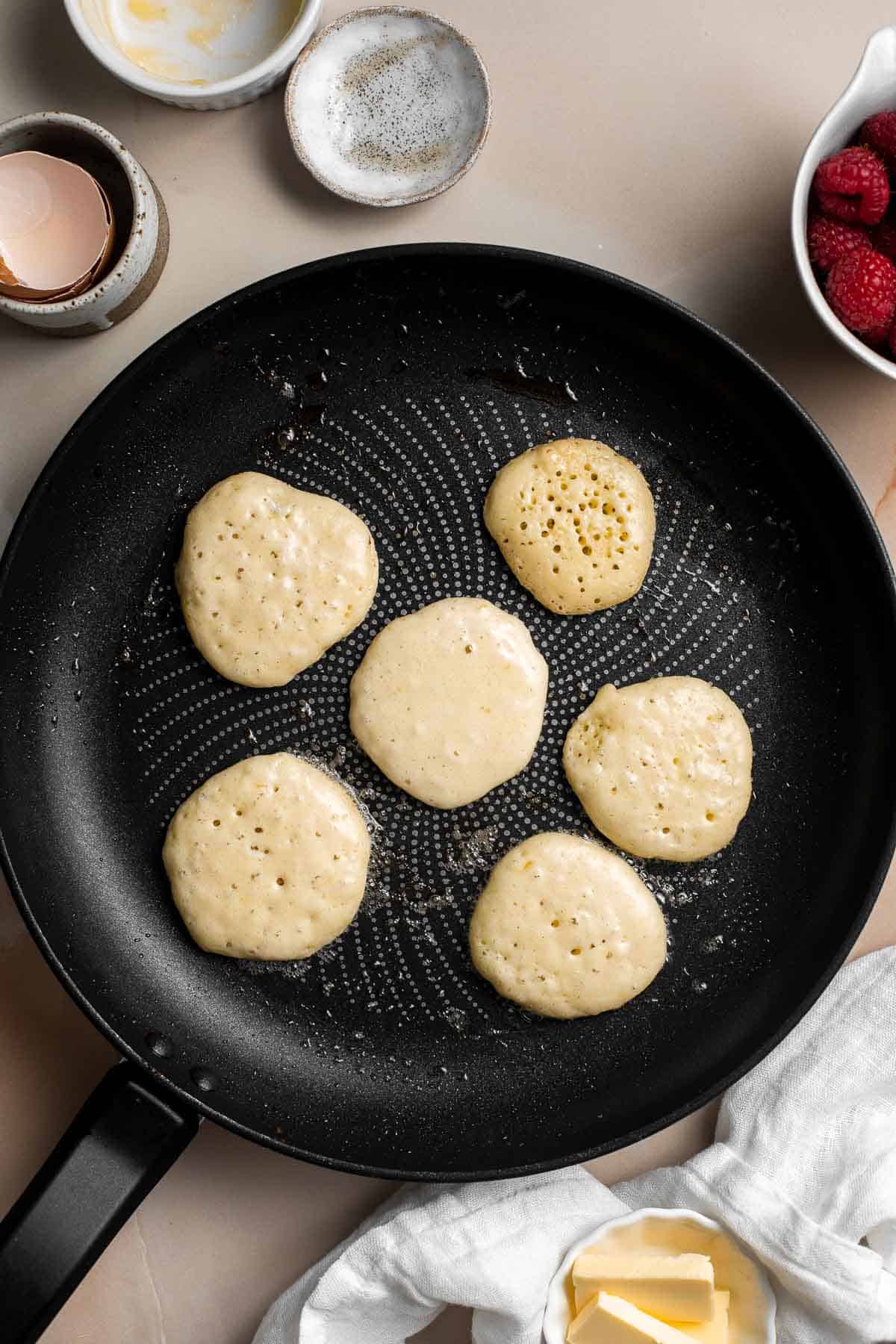 Mini Pancakes (Silver Dollar Pancakes) are the fluffy, fun-sized version of classic pancakes. They're easy to make using a handful of everyday ingredients. | aheadofthyme.com