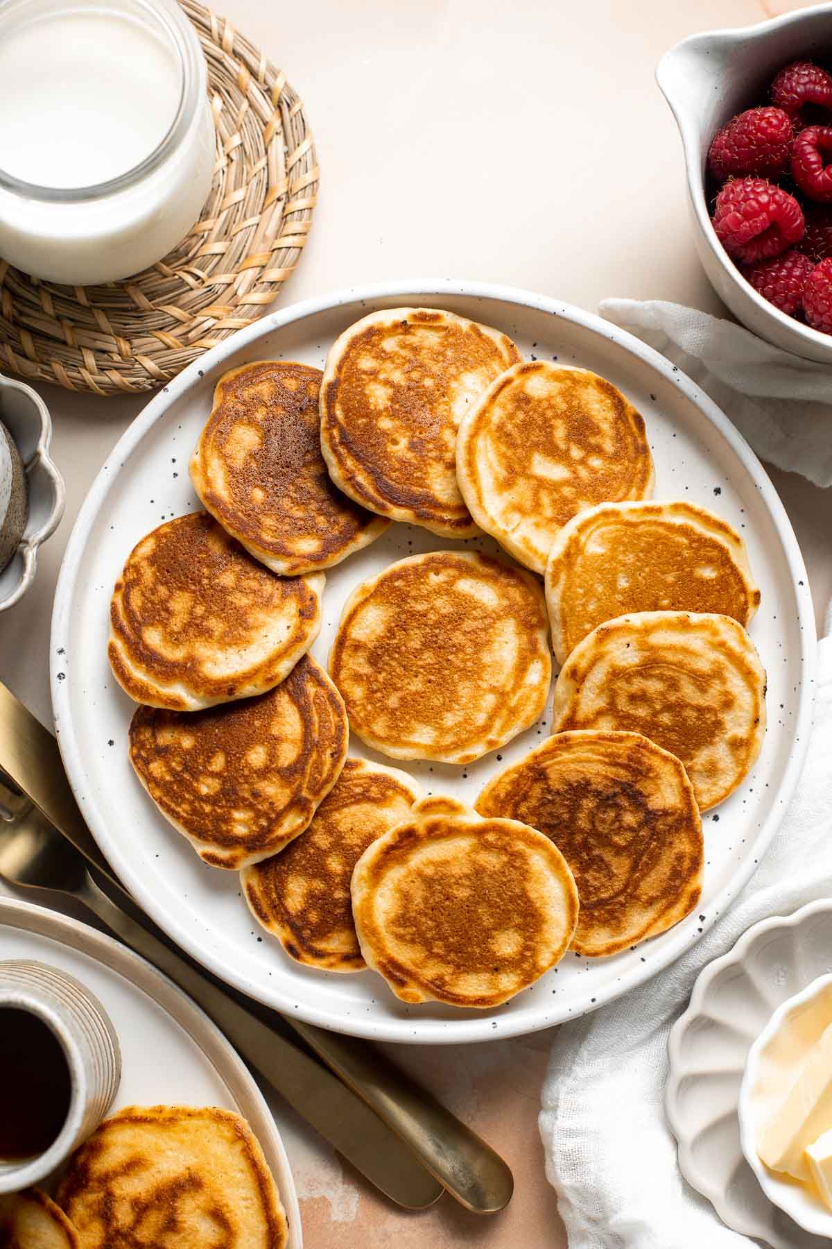 Mini Pancakes (Silver Dollar Pancakes) are the fluffy, fun-sized version of classic pancakes. They're easy to make using a handful of everyday ingredients. | aheadofthyme.com