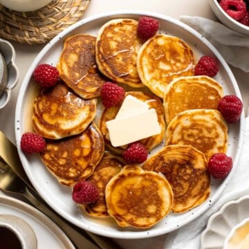 Mini Pancakes (Silver Dollar Pancakes) are the fluffy, fun-sized version of classic pancakes. They're easy to make using a handful of everyday ingredients. | aheadofthyme.com