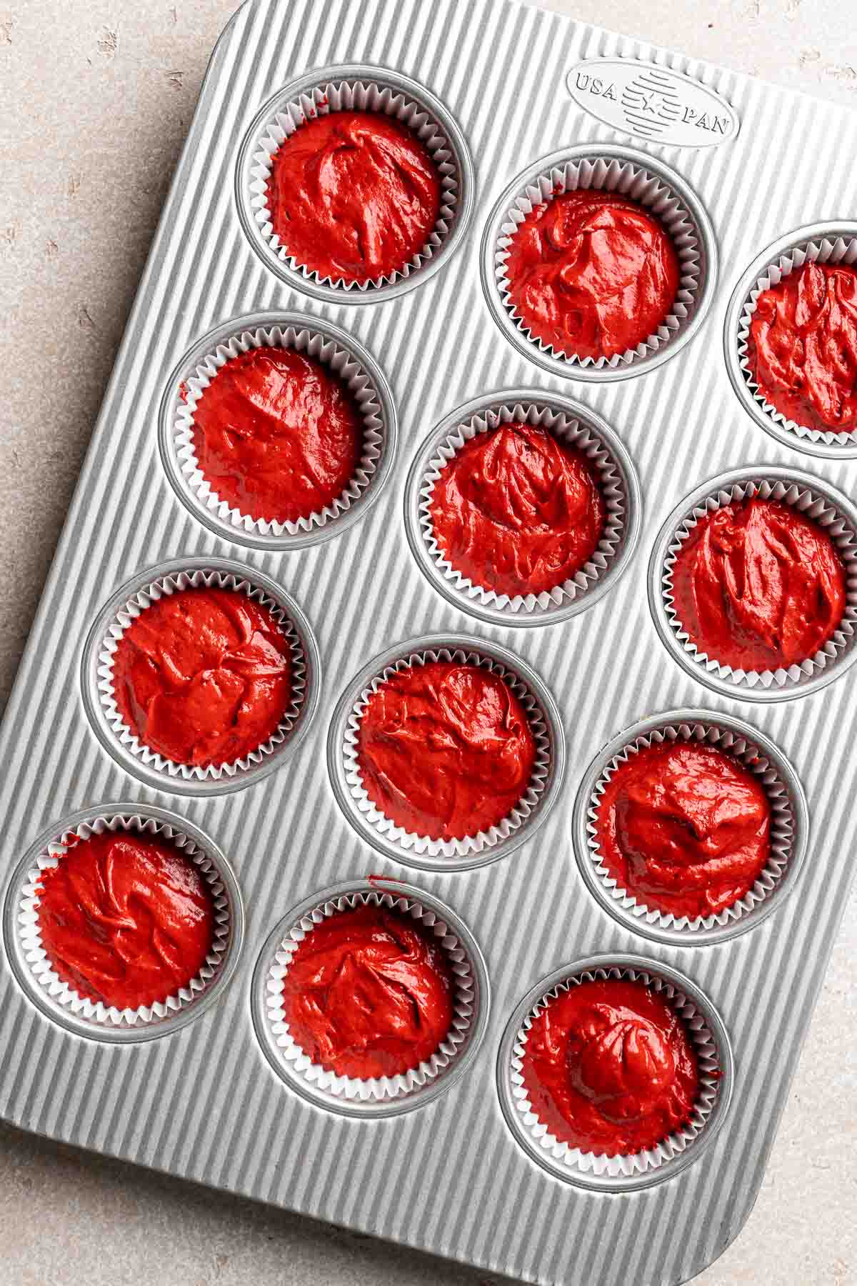 These Red Velvet Cupcakes with cream cheese frosting are delicious, moist, rich, and perfectly sweet. Top these Valentine’s cupcakes with festive sprinkles. | aheadofthyme.com