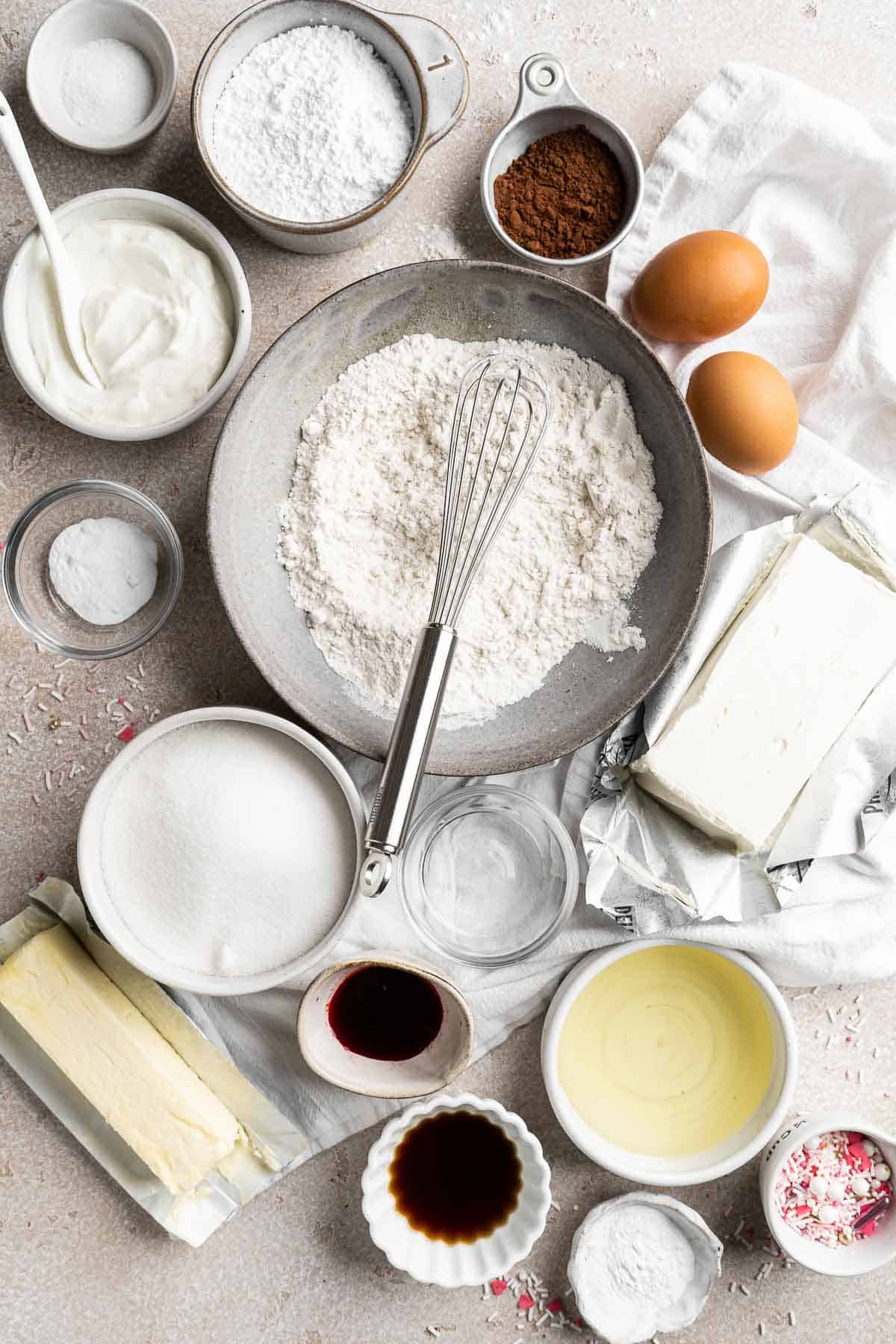 These Red Velvet Cupcakes with cream cheese frosting are delicious, moist, rich, and perfectly sweet. Top these Valentine’s cupcakes with festive sprinkles. | aheadofthyme.com