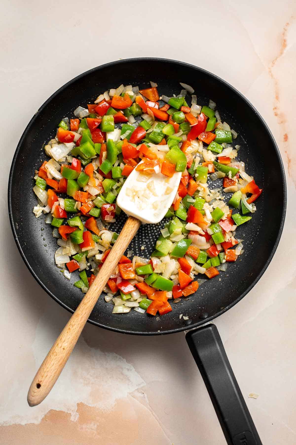 These Sheet Pan Quesadillas are loaded with veggies and gooey cheese, baked in the oven until crispy, and made to feed a crowd in just 30 minutes. | aheadofthyme.com