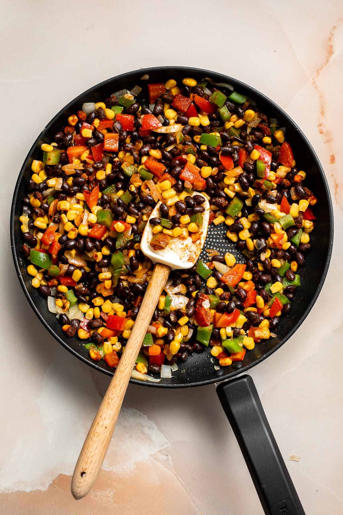 These Sheet Pan Quesadillas are loaded with veggies and gooey cheese, baked in the oven until crispy, and made to feed a crowd in just 30 minutes. | aheadofthyme.com