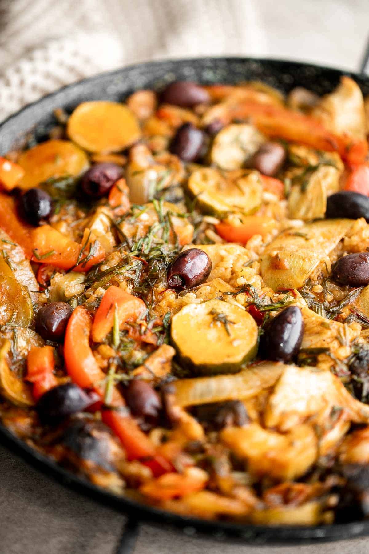 Vegetarian Paella is a delicious flavorful classic Spanish rice dish that is hearty and filling — perfectly cooked rice with saffron and vegetables. | aheadofthyme.com