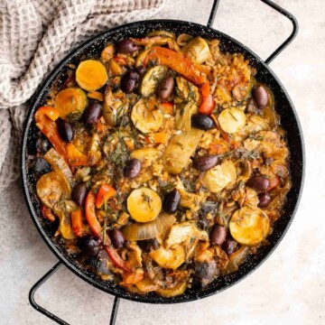 Vegetarian Paella is a delicious flavorful classic Spanish rice dish that is hearty and filling — perfectly cooked rice with saffron and vegetables. | aheadofthyme.com