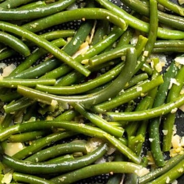 Lemon Parmesan Green Beans are the perfect side to any entree dinner meal — buttery, lemony, and cheesy. This quick side dish is easy to make in 20 minutes. | aheadofthyme.com