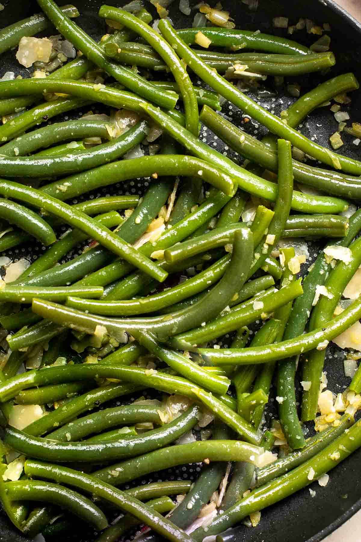 Lemon Parmesan Green Beans are the perfect side to any entree dinner meal — buttery, lemony, and cheesy. This quick side dish is easy to make in 20 minutes. | aheadofthyme.com