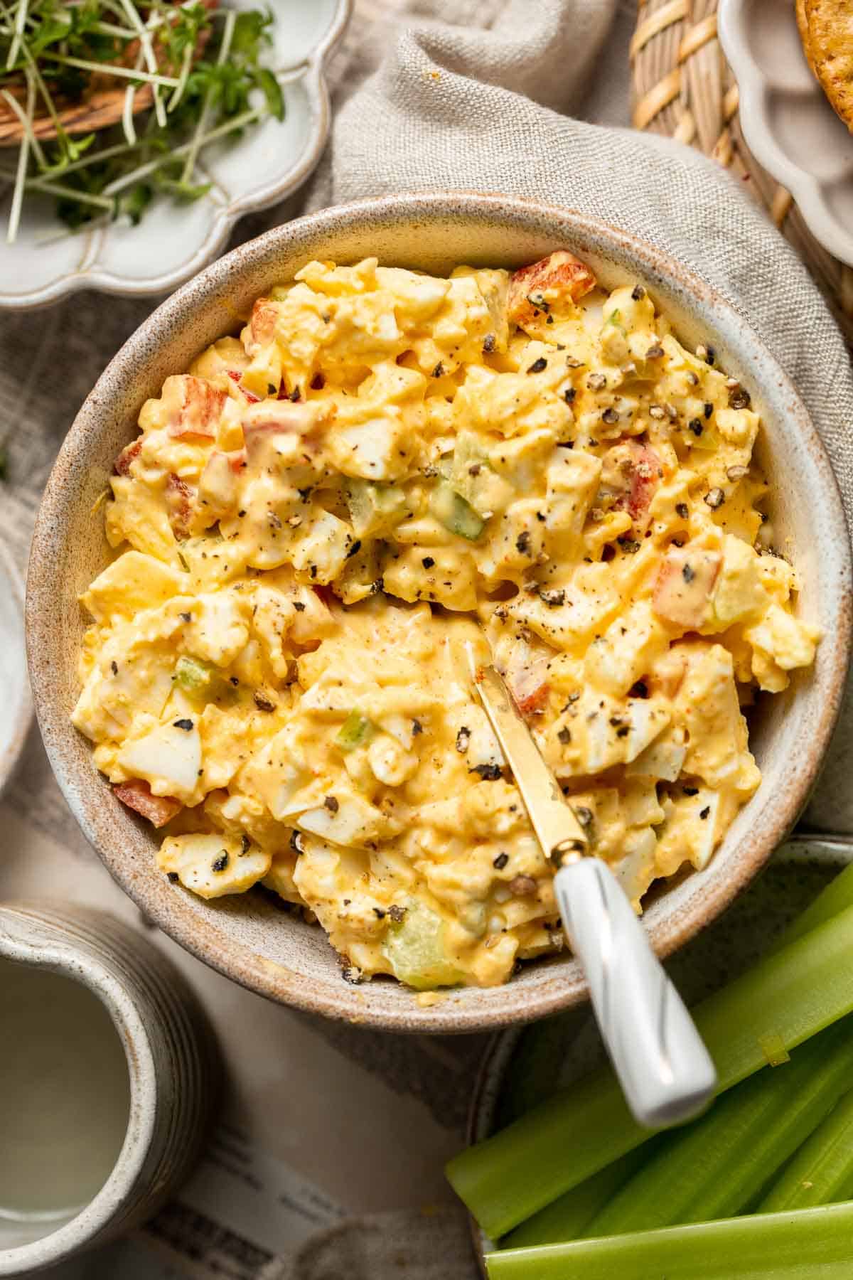 Deviled Egg Salad is the perfect spring side dish! It has the signature tang and smokiness of deviled eggs with the pillowy texture of egg salad. | aheadofthyme.com