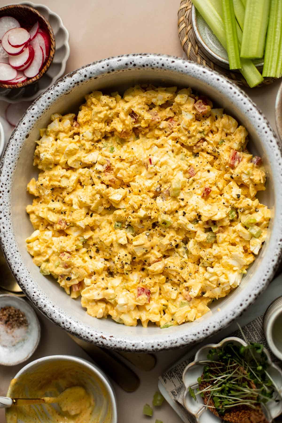 Deviled Egg Salad is the perfect spring side dish! It has the signature tang and smokiness of deviled eggs with the pillowy texture of egg salad. | aheadofthyme.com