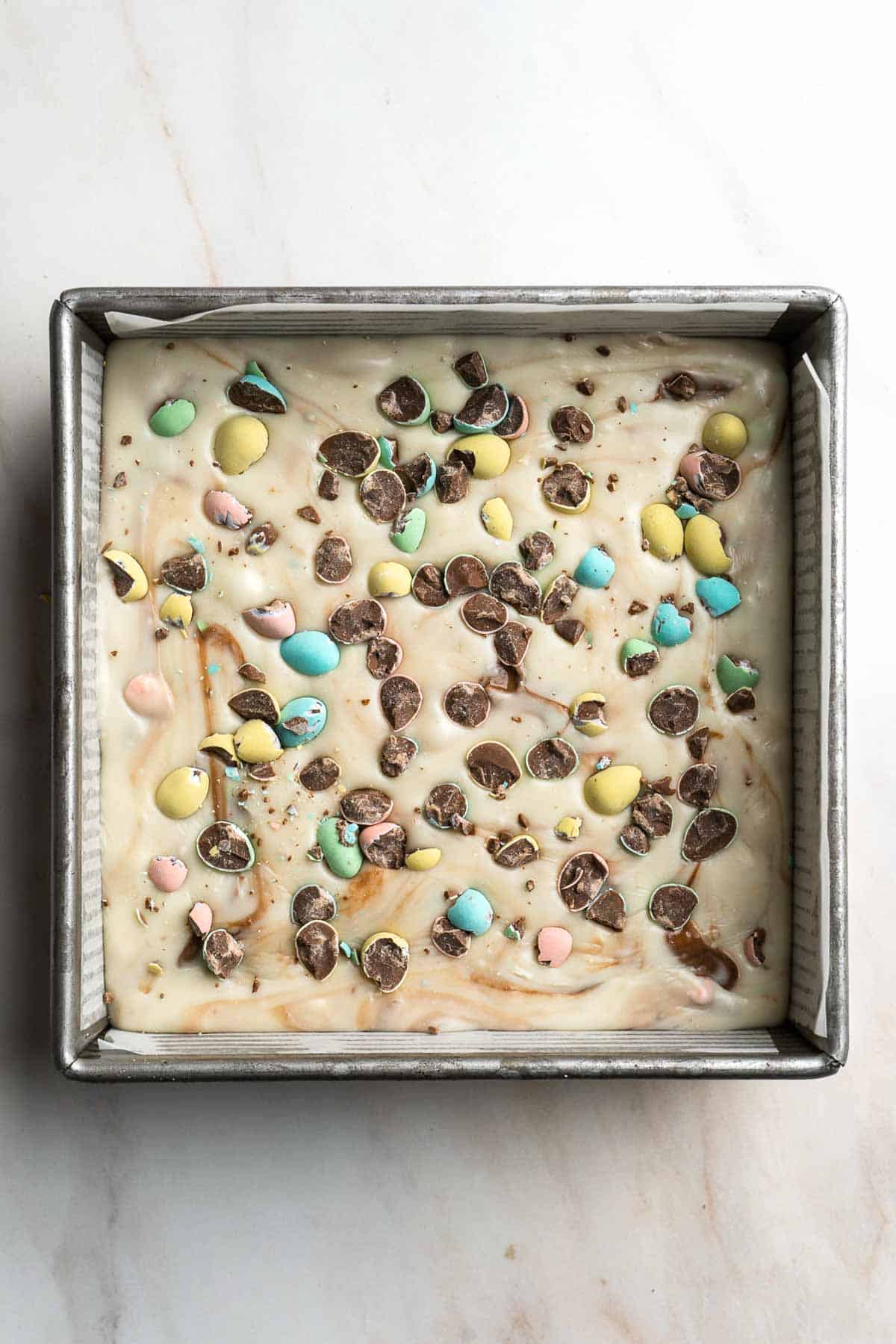 Mini Egg Easter Fudge is a rich, sweet, and colorful white chocolate fudge that is easy to make from scratch with just 3 simple ingredients. | aheadofthyme.com