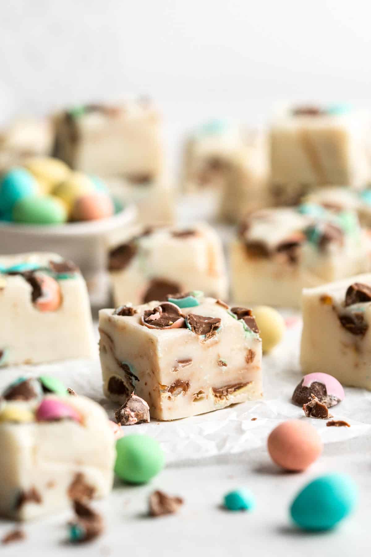 Mini Egg Easter Fudge is a rich, sweet, and colorful white chocolate fudge that is easy to make from scratch with just 3 simple ingredients. | aheadofthyme.com