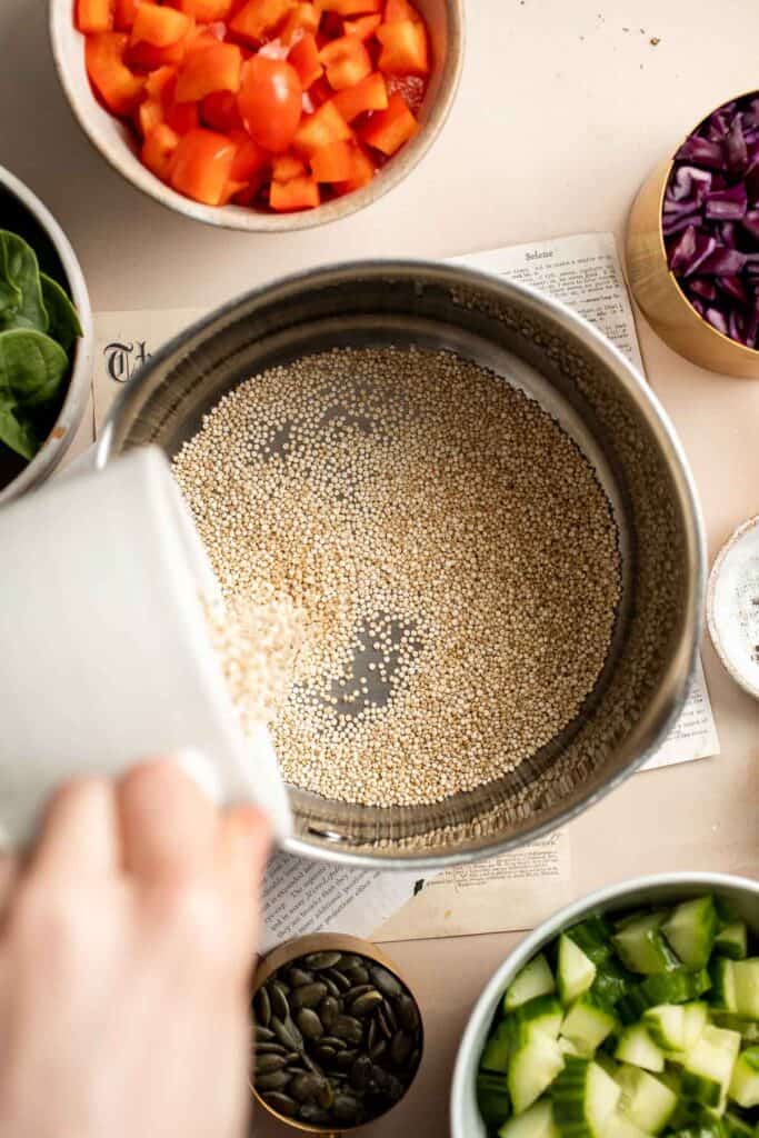 This vegan Buddha Bowl is the perfect hybrid of a salad and grain bowl that is packed with nutritious ingredients like grains, vegetables, and protein. | aheadofthyme.com