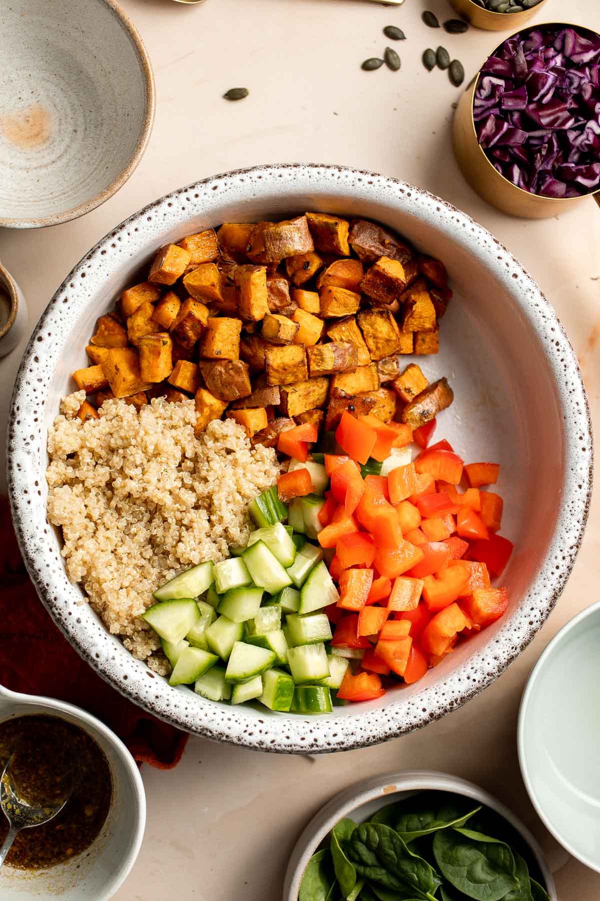 This vegan Buddha Bowl is the perfect hybrid of a salad and grain bowl that is packed with nutritious ingredients like grains, vegetables, and protein. | aheadofthyme.com