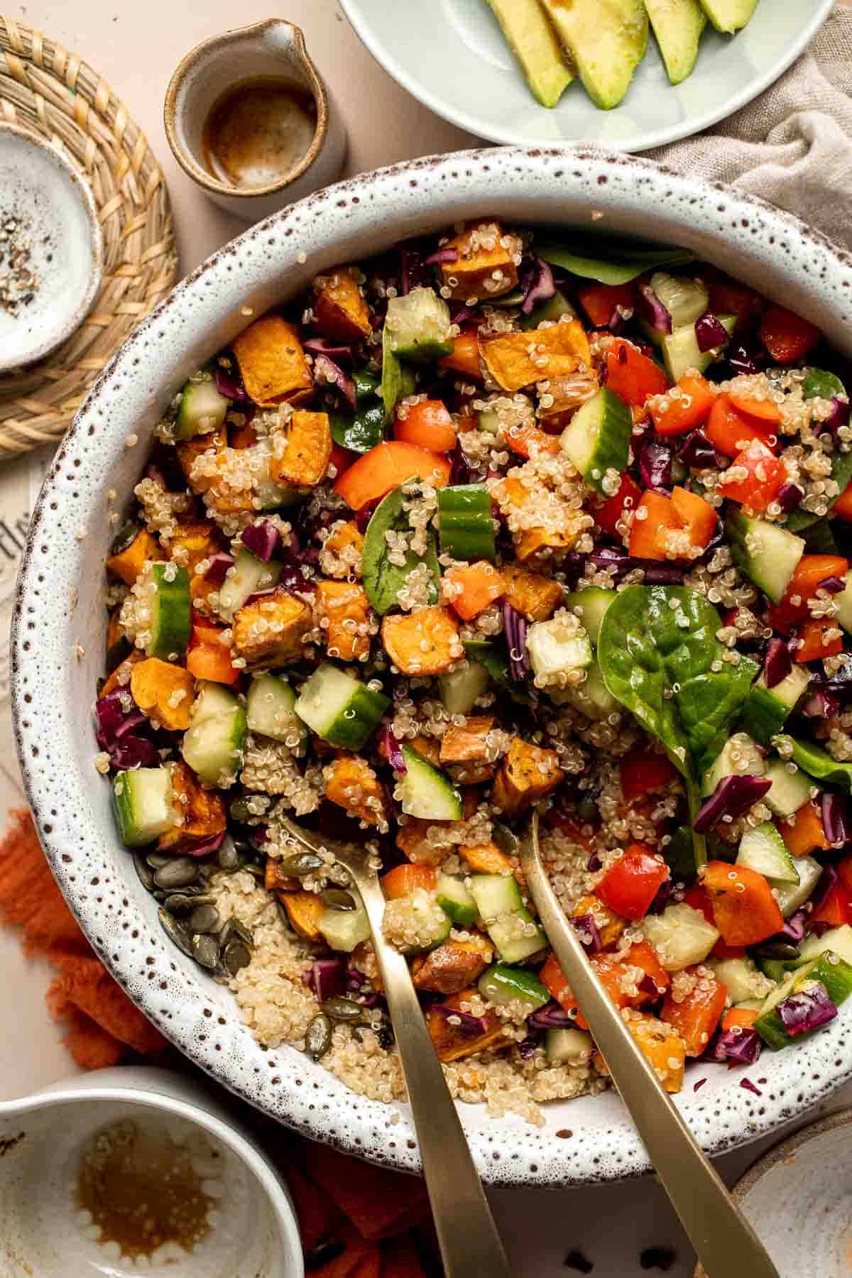 This vegan Buddha Bowl is the perfect hybrid of a salad and grain bowl that is packed with nutritious ingredients like grains, vegetables, and protein. | aheadofthyme.com