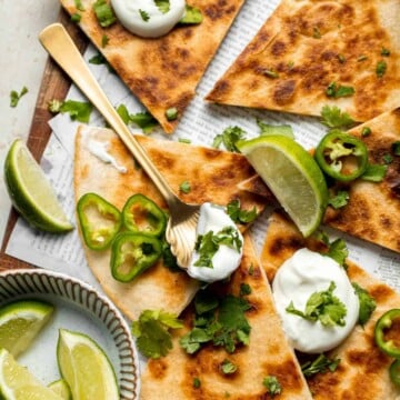 This Cheese Quesadilla has the perfect combination of crispy, cheesy, and flavorful. Ready to serve in just a few minutes with your favorite toppings. | aheadofthyme.com