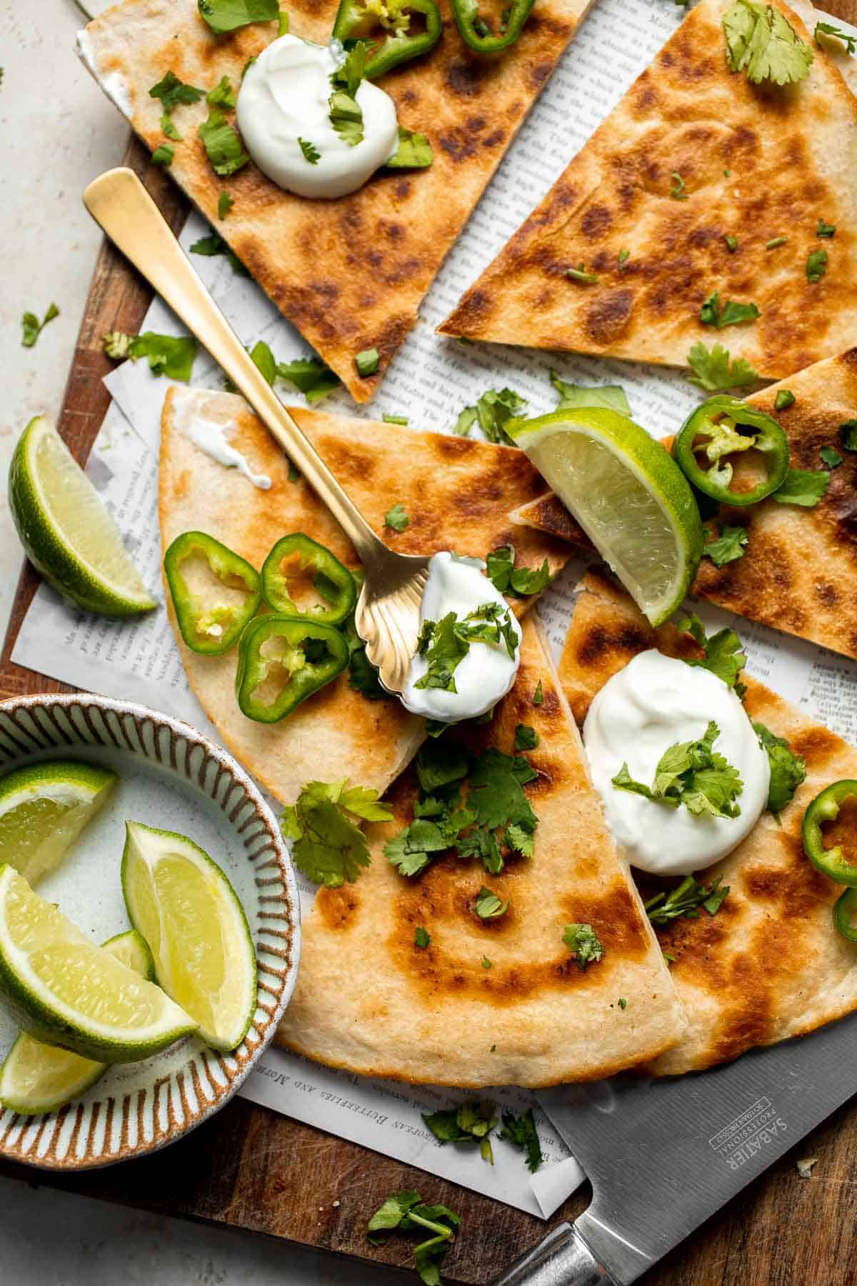 This Cheese Quesadilla has the perfect combination of crispy, cheesy, and flavorful. Ready to serve in just a few minutes with your favorite toppings. | aheadofthyme.com