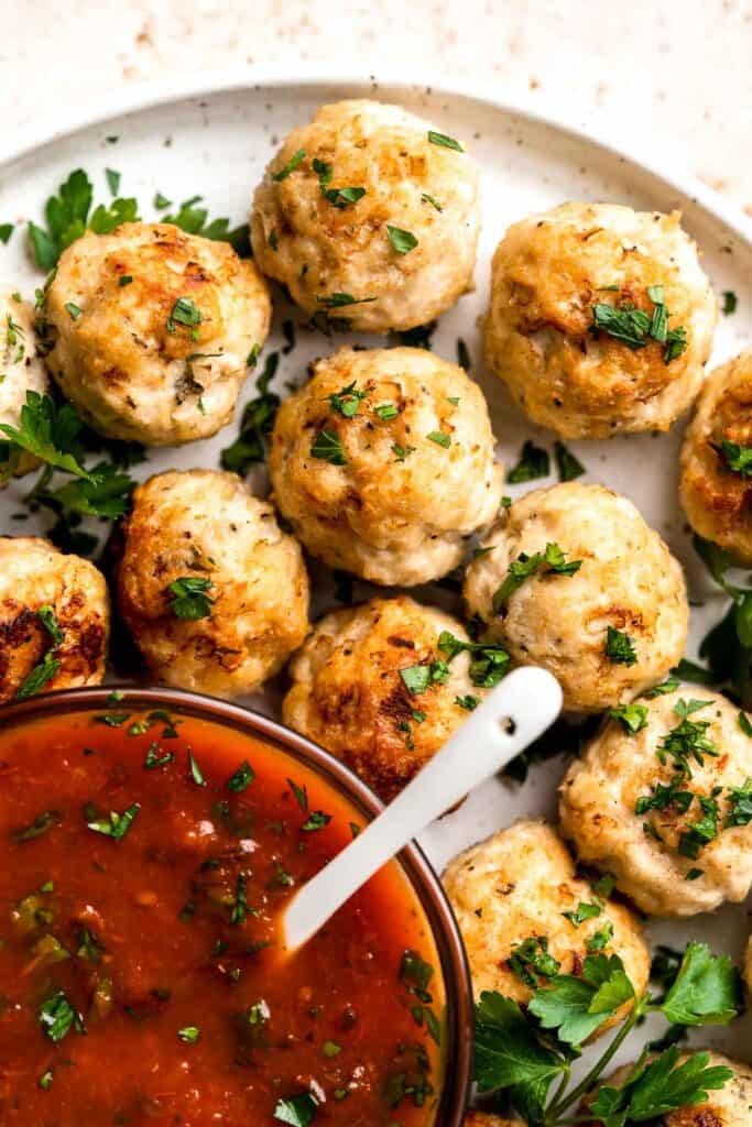 Baked Chicken Meatballs are tender, juicy, and flavorful (no dry meatballs here!). Made in just 45 minutes using simple ingredients. So quick and easy! | aheadofthyme.com