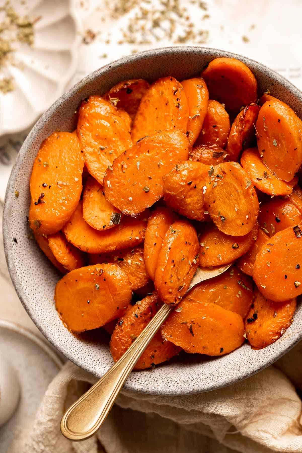 Roasted Carrots are a healthy, delicious, and easy to make side dish with a slightly crispy interior and sweet and tender inside. Serve with any entree! | aheadofthyme.com