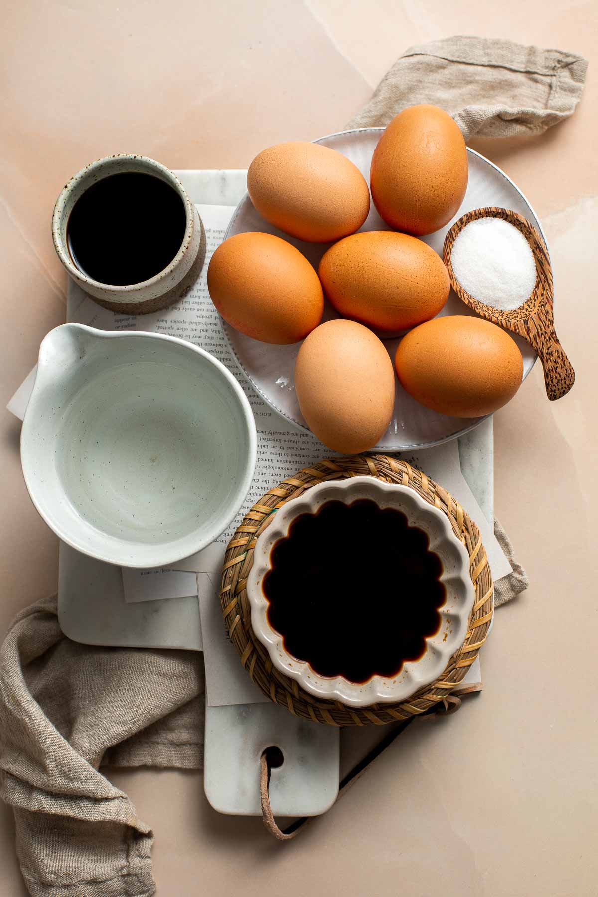 Soy Sauce Eggs (Ramen Eggs) are umami with a firm white and jammy center. The salty, savory flavor is easy to make with a simple 4-ingredient marinade. | aheadofthyme.com