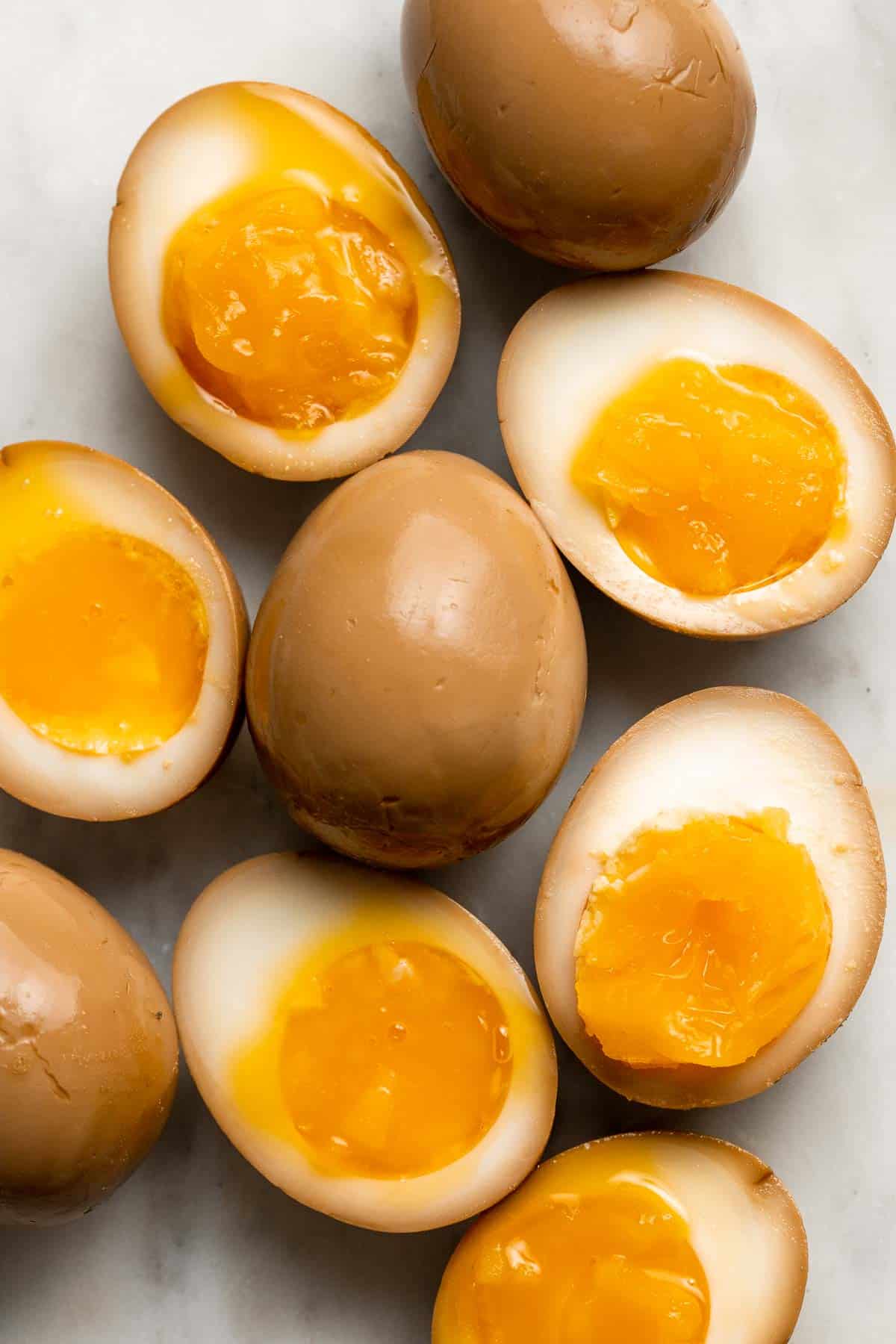 Soy Sauce Eggs (Ramen Eggs) are umami with a firm white and jammy center. The salty, savory flavor is easy to make with a simple 4-ingredient marinade. | aheadofthyme.com