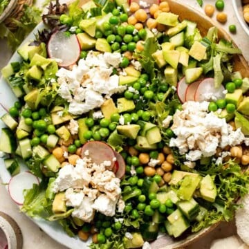 This Spring Salad is light, fresh, and vibrant. It is packed with fresh seasonal vegetables and chickpeas tossed in a homemade honey balsamic dressing. | aheadofthyme.com