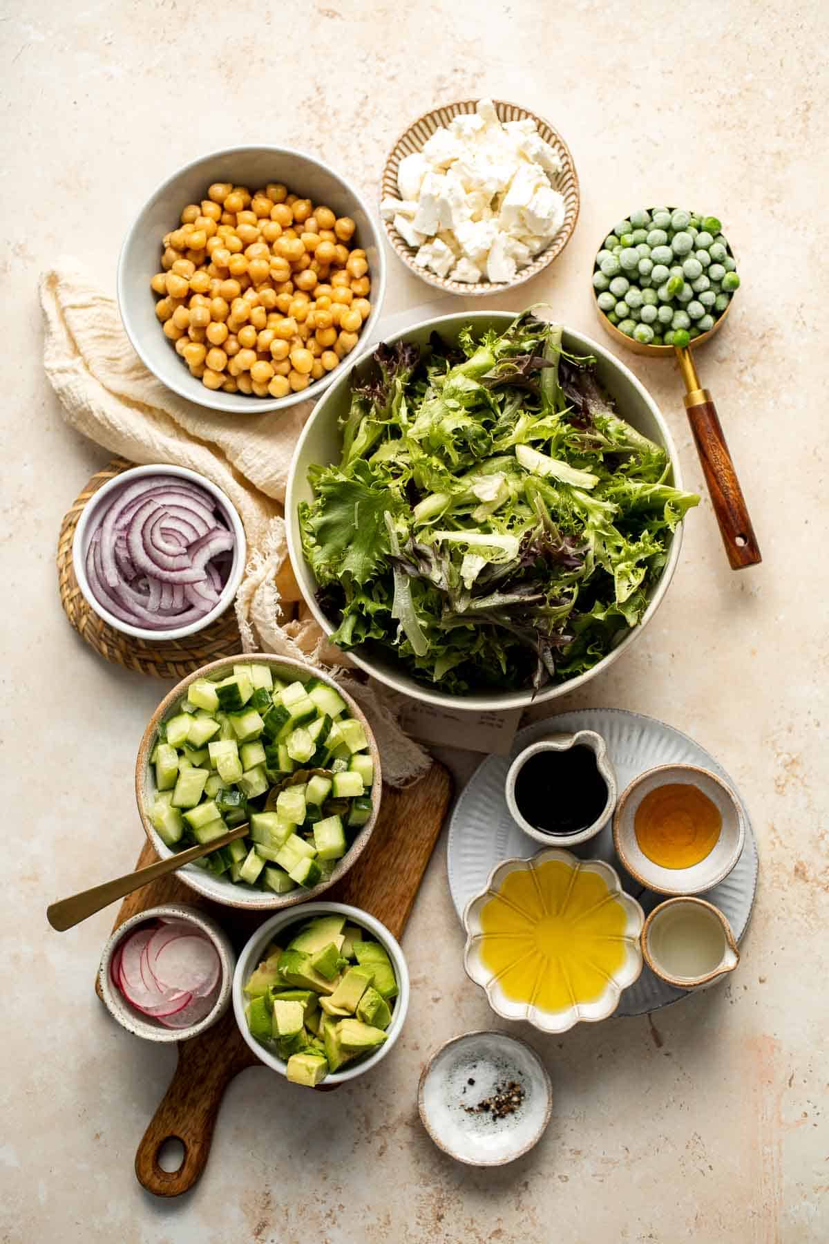 This Spring Salad is light, fresh, and vibrant. It is packed with fresh seasonal vegetables and chickpeas tossed in a homemade honey balsamic dressing. | aheadofthyme.com