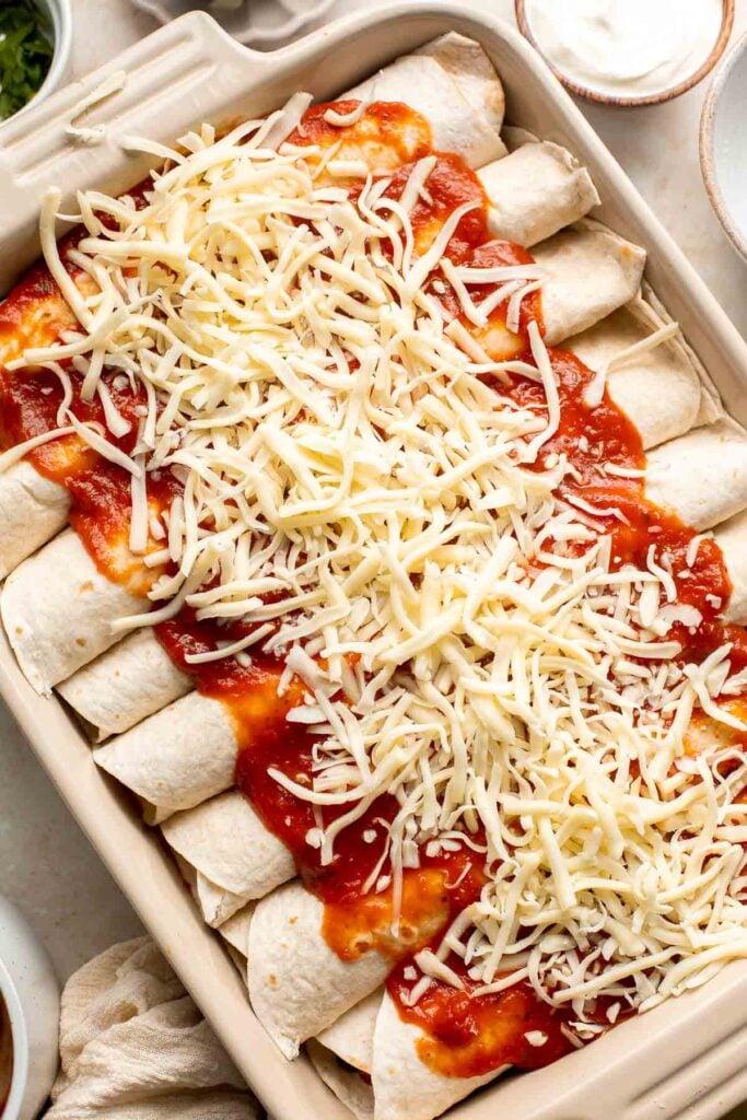 Vegetarian Enchiladas are packed with hearty and nutritious vegetables, well-seasoned with spices and saucy enchilada sauce, and topped with melty cheese. | aheadofthyme.com