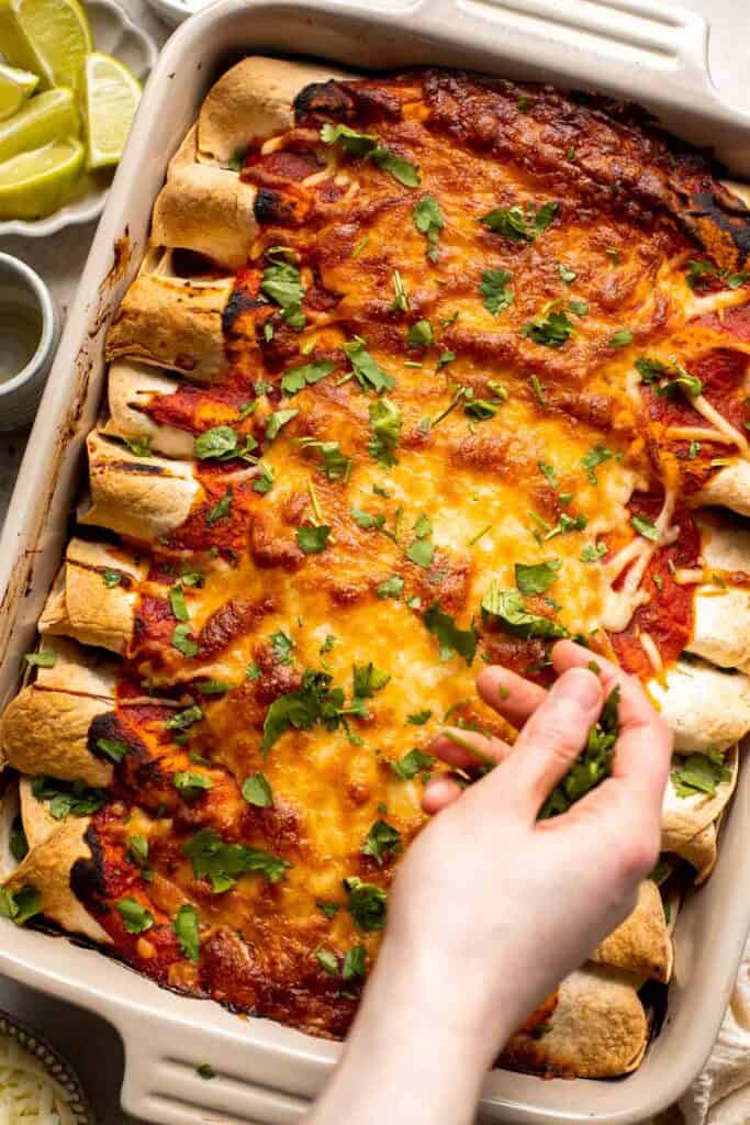 Vegetarian Enchiladas are packed with hearty and nutritious vegetables, well-seasoned with spices and saucy enchilada sauce, and topped with melty cheese. | aheadofthyme.com