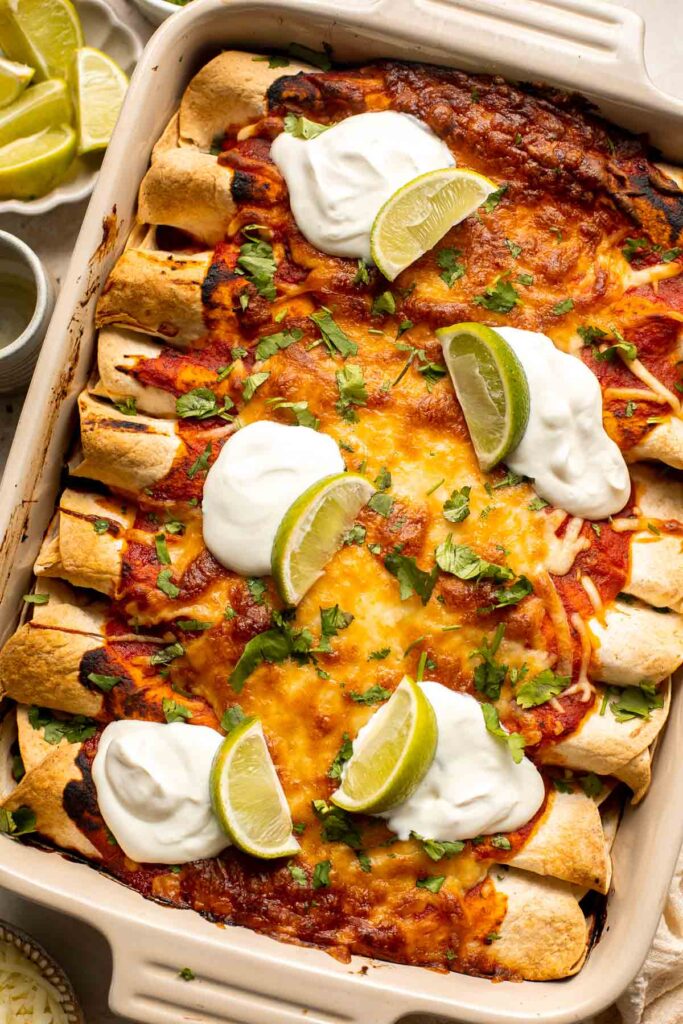 Vegetarian Enchiladas are packed with hearty and nutritious vegetables, well-seasoned with spices and saucy enchilada sauce, and topped with melty cheese. | aheadofthyme.com