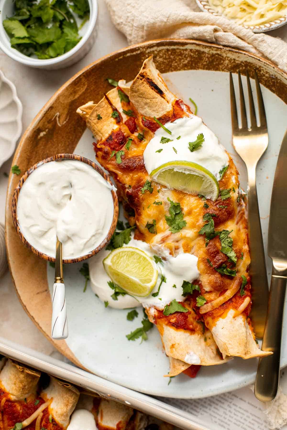 Vegetarian Enchiladas are packed with hearty and nutritious vegetables, well-seasoned with spices and saucy enchilada sauce, and topped with melty cheese. | aheadofthyme.com