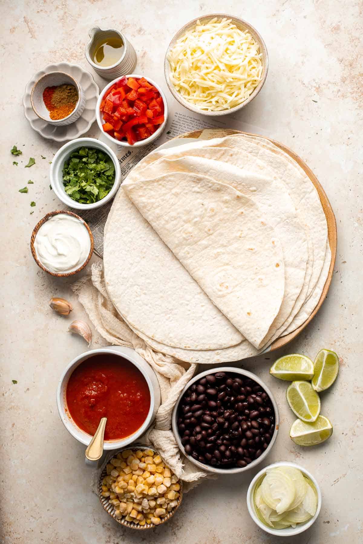 Vegetarian Enchiladas are packed with hearty and nutritious vegetables, well-seasoned with spices and saucy enchilada sauce, and topped with melty cheese. | aheadofthyme.com