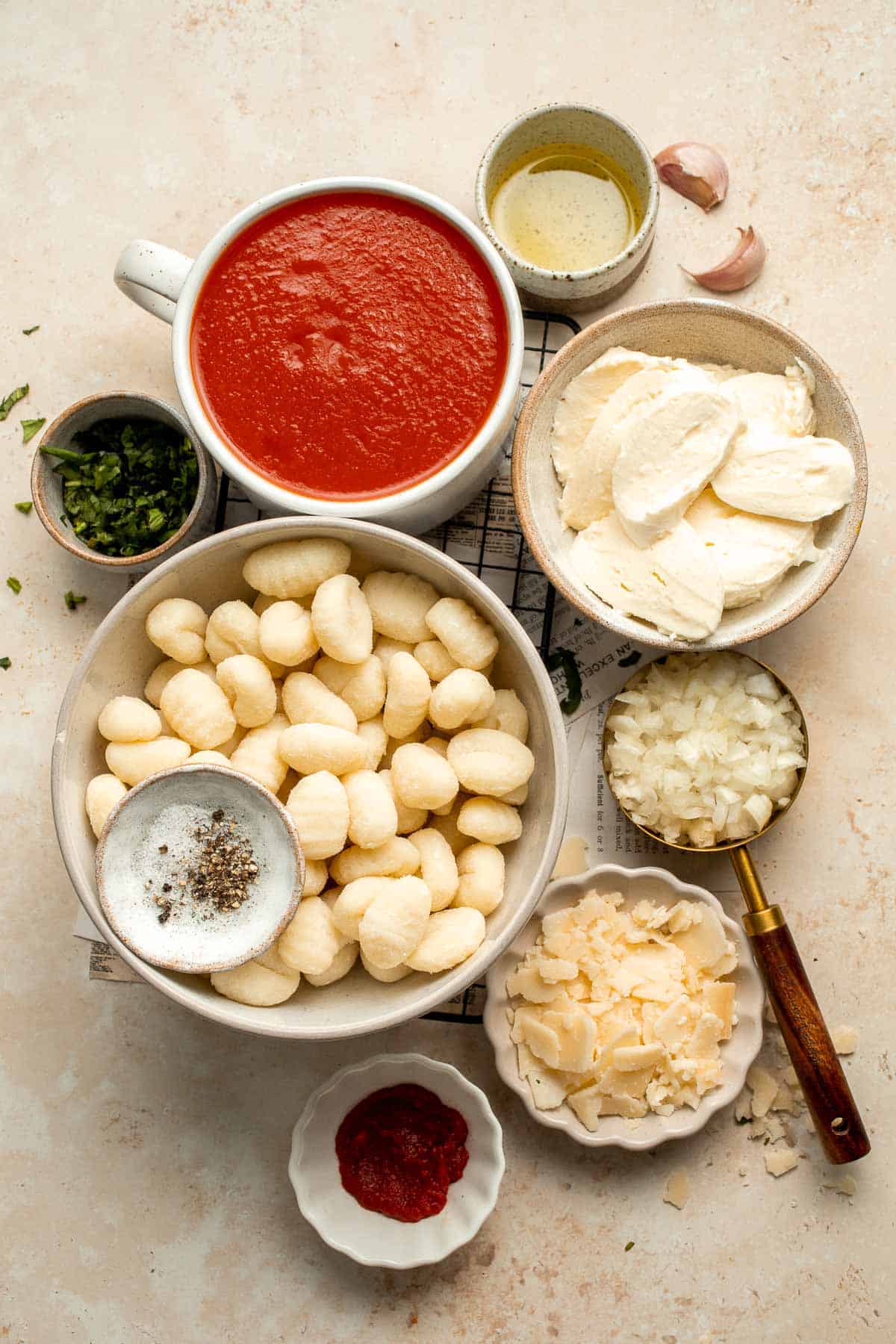 Cheesy Baked Gnocchi is quick and easy comfort food made all in one pot with chewy bites of gnocchi, a simple tomato-based sauce, and gooey melty cheese. | aheadofthyme.com