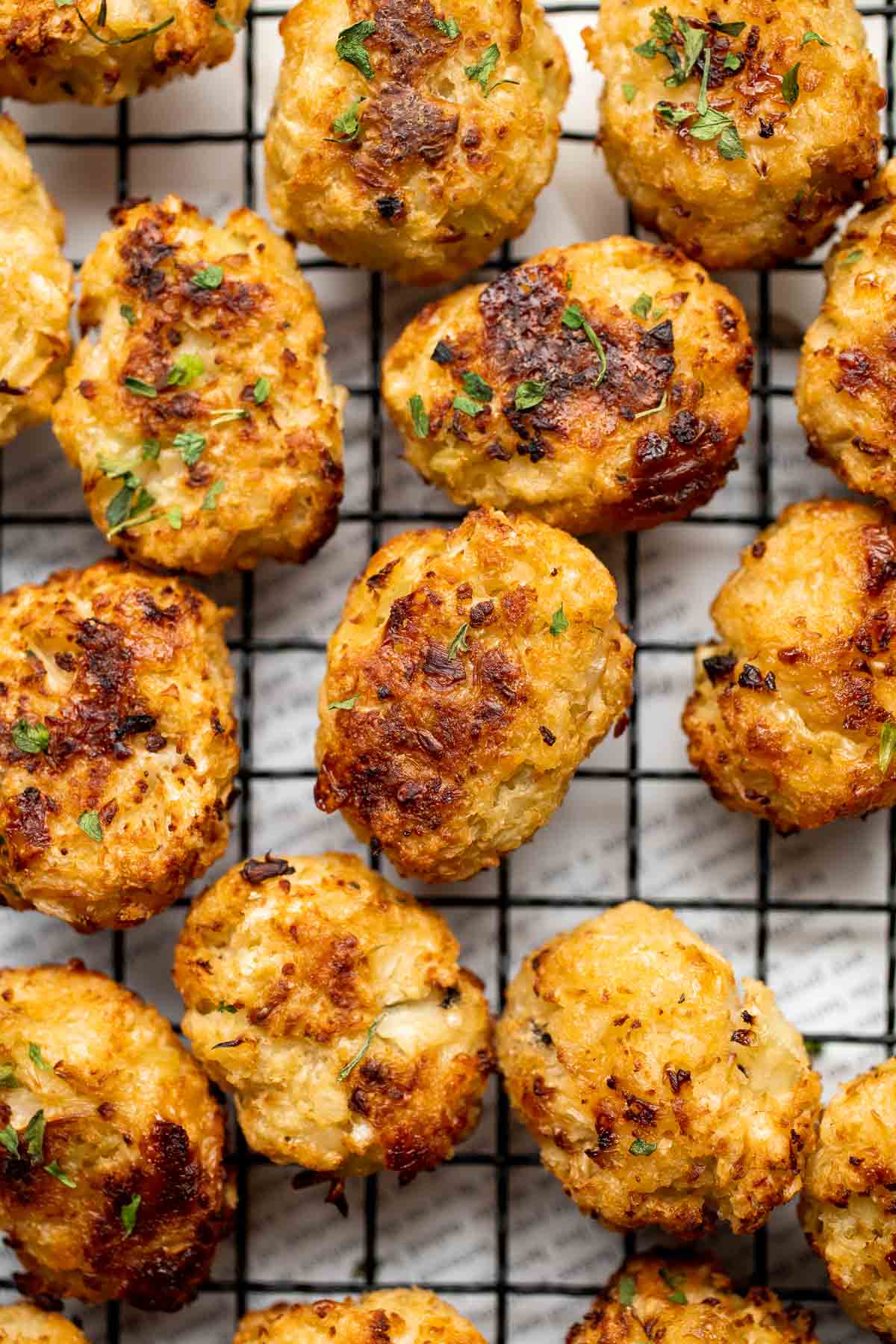 These Cauliflower Tots are everything you want in a tater tot — but better! They are crunchy on the outside, tender inside, higher in fiber, and cheesy. | aheadofthyme.com