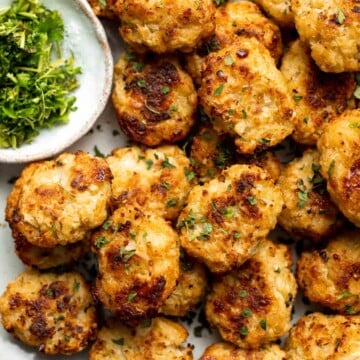 These Cauliflower Tots are everything you want in a tater tot — but better! They are crunchy on the outside, tender inside, higher in fiber, and cheesy. | aheadofthyme.com