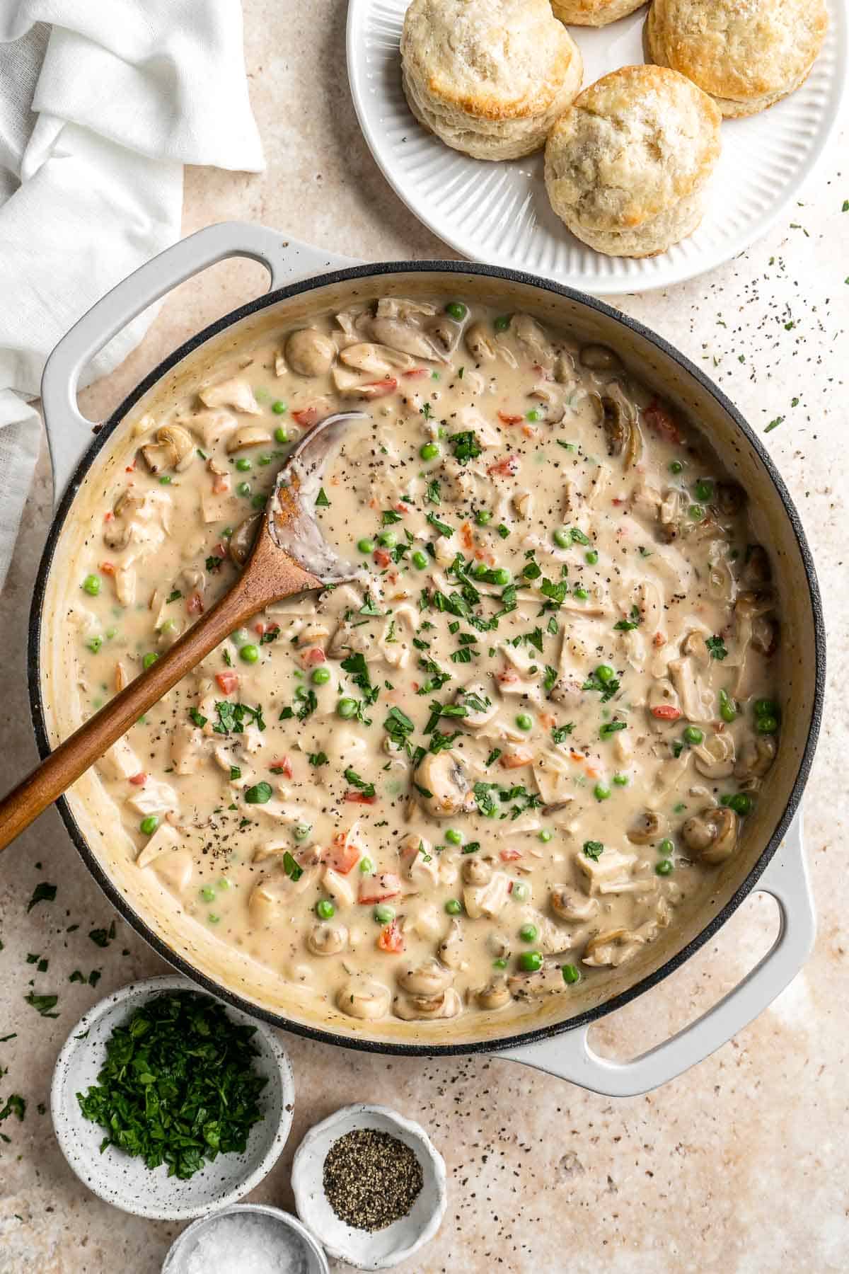 Chicken a la King is rich, creamy, and hearty comfort food. This 30-minute dinner recipe contains chicken and veggies in a cream sauce made from scratch. | aheadofthyme.com