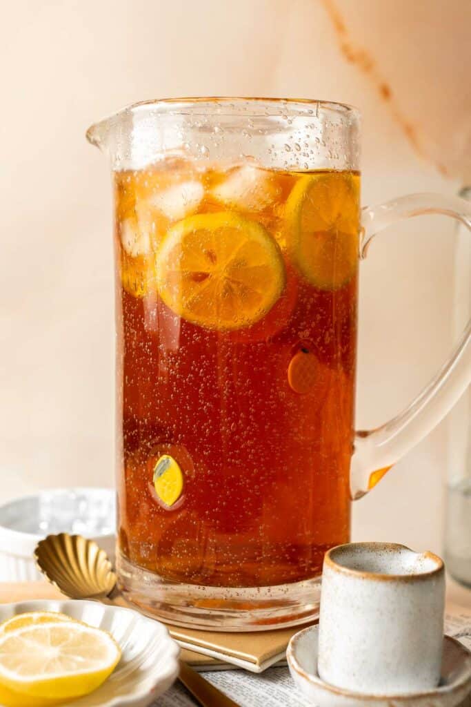 This Homemade Iced Tea made with only 10 minutes of prep using green or black tea, sugar, and water is sweet and refreshing — a perfect summer drink. | aheadofthyme.com