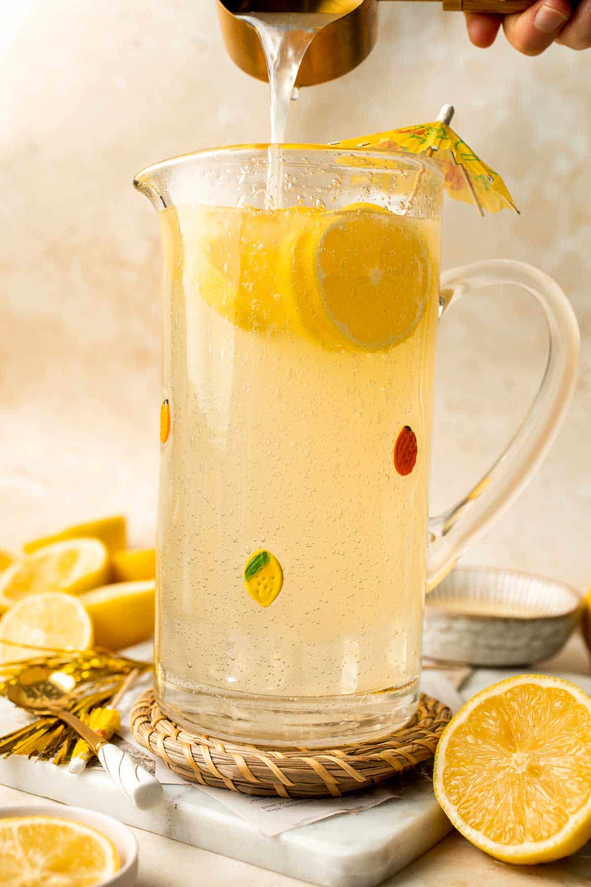 Homemade Lemonade is a fresh summer drink with the perfect balance of tart and sweet. It is easy to make from scratch with only 3 simple ingredients! | aheadofthyme.com