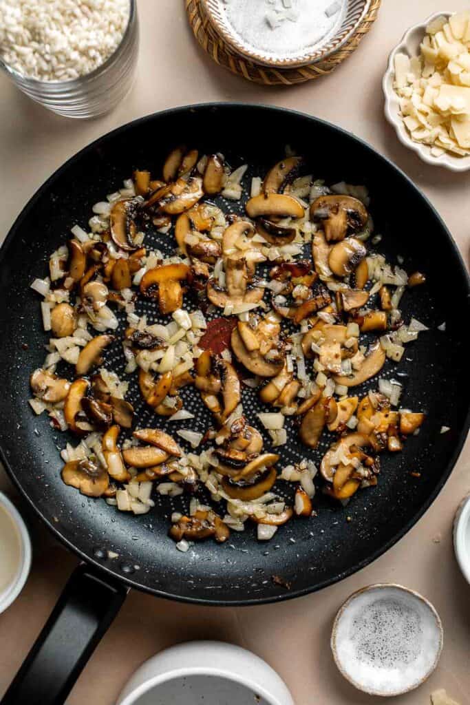 Mushroom Risotto is a rich creamy one pot rice dish made with simple ingredients that deliver bold flavors. Making homemade risotto from scratch is easy! | aheadofthyme.com