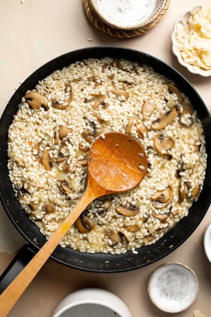Mushroom Risotto is a rich creamy one pot rice dish made with simple ingredients that deliver bold flavors. Making homemade risotto from scratch is easy! | aheadofthyme.com