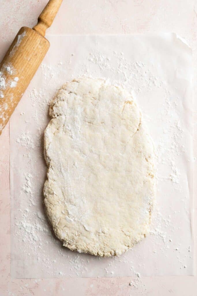 Classic Strawberry Shortcake is a small, layered cake featuring fluffy crumbly biscuits, a fresh strawberry filling, and homemade whipped cream. | aheadofthyme.com