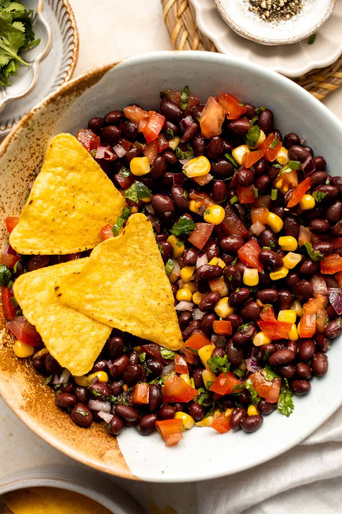 This quick and easy Black Bean Salsa is a delicious Mexican dip loaded with black beans, veggies, cilantro, and lime juice for the best summer flavor. | aheadofthyme.com