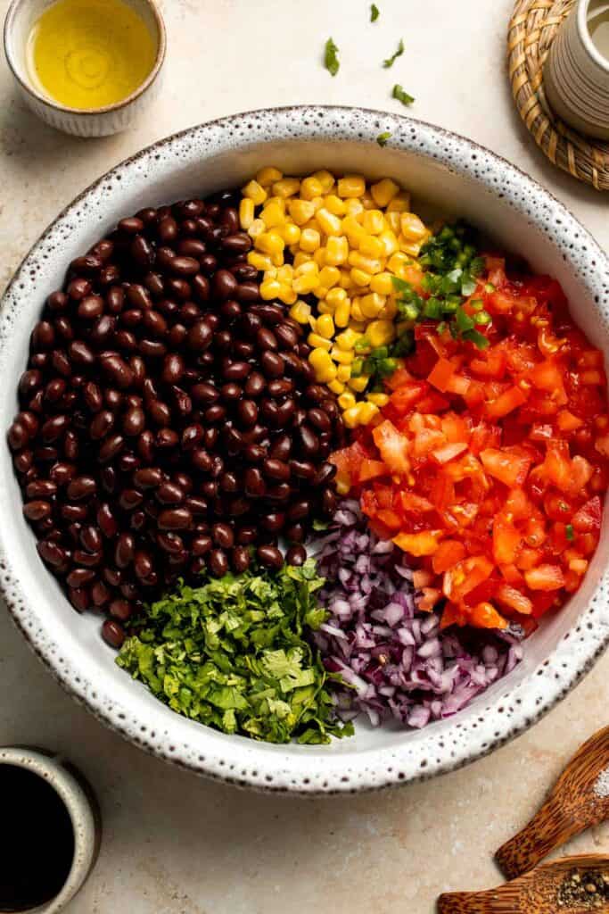 This quick and easy Black Bean Salsa is a delicious Mexican dip loaded with black beans, veggies, cilantro, and lime juice for the best summer flavor. | aheadofthyme.com