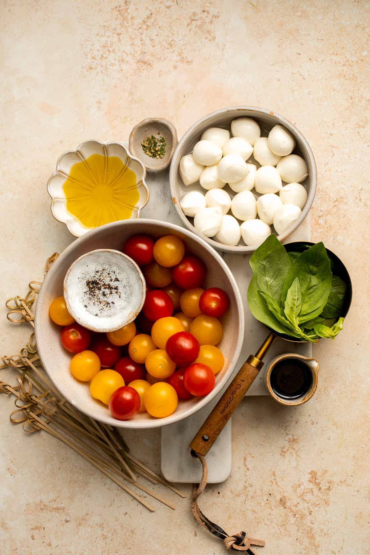 Caprese Skewers are a quick and fresh appetizer made with bite-sized mozzarella, juicy tomatoes, and basil leaves with a drizzle of balsamic glaze. | aheadofthyme.com