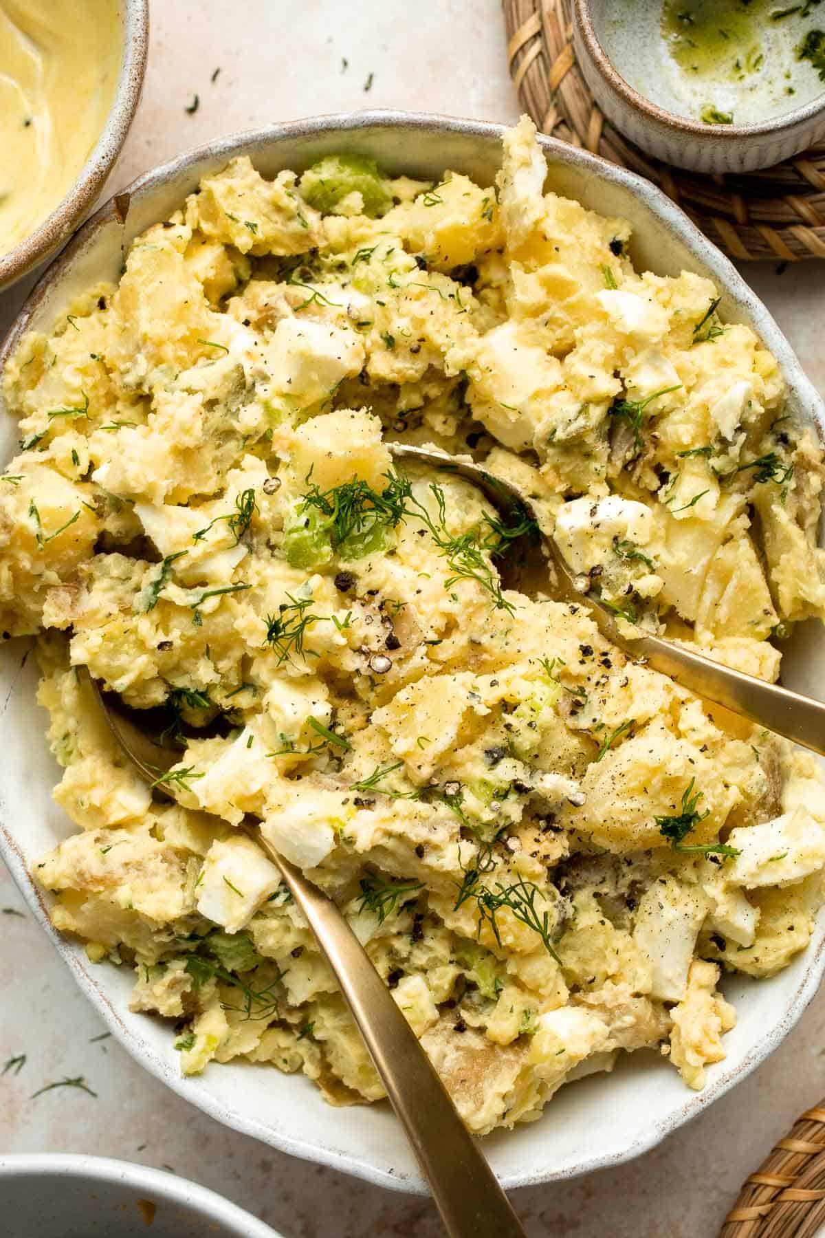 Classic Potato Salad is tangy and creamy with chunks of fluffy potatoes, soft eggs, and crunchy vegetables. It’s a perfect, quick and easy summer side dish. | aheadofthyme.com