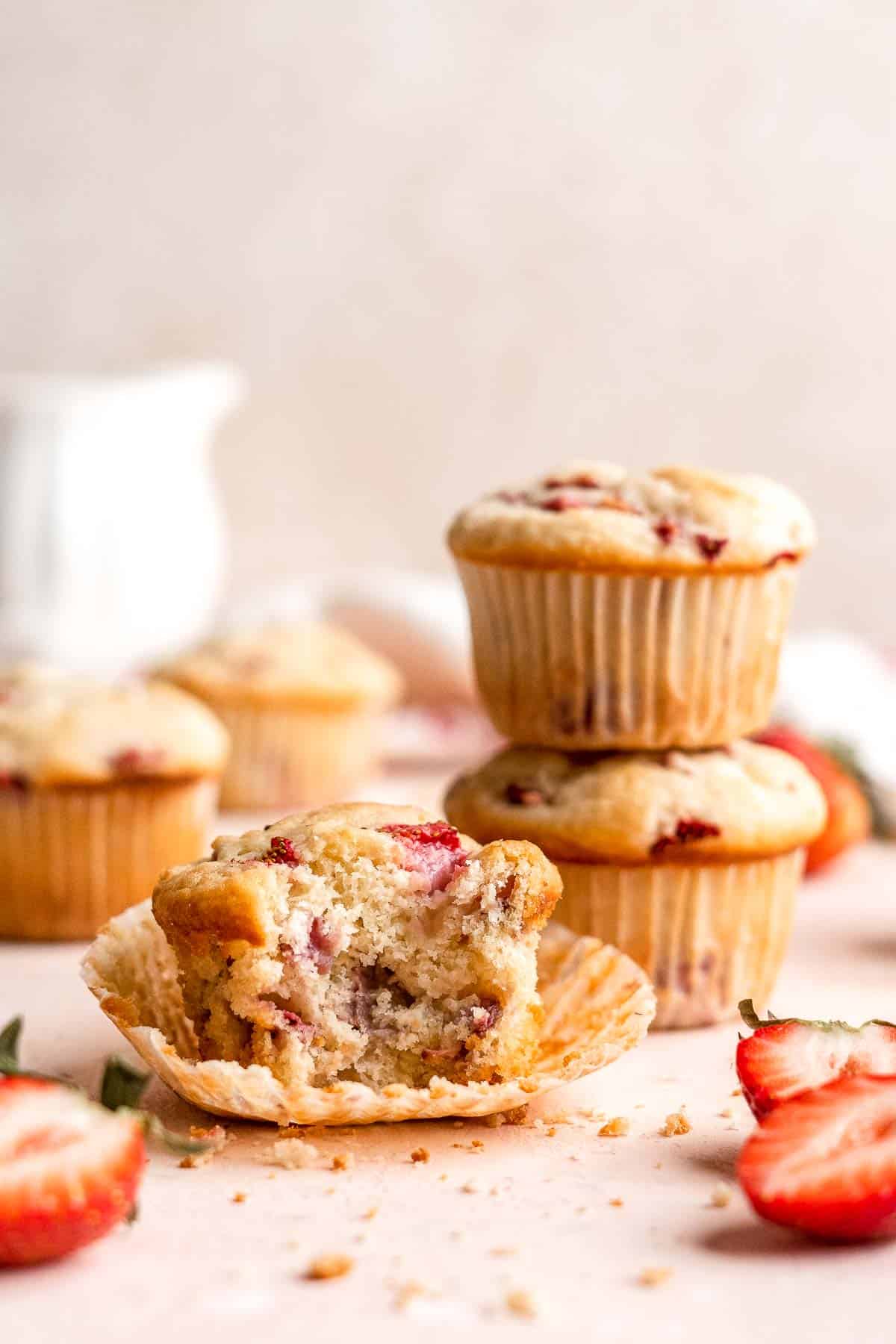 Strawberry Muffins are tender, fluffy, and delicious! They are golden-brown and crisp outside while moist and cake-like inside and loaded with strawberries. | aheadofthyme.com