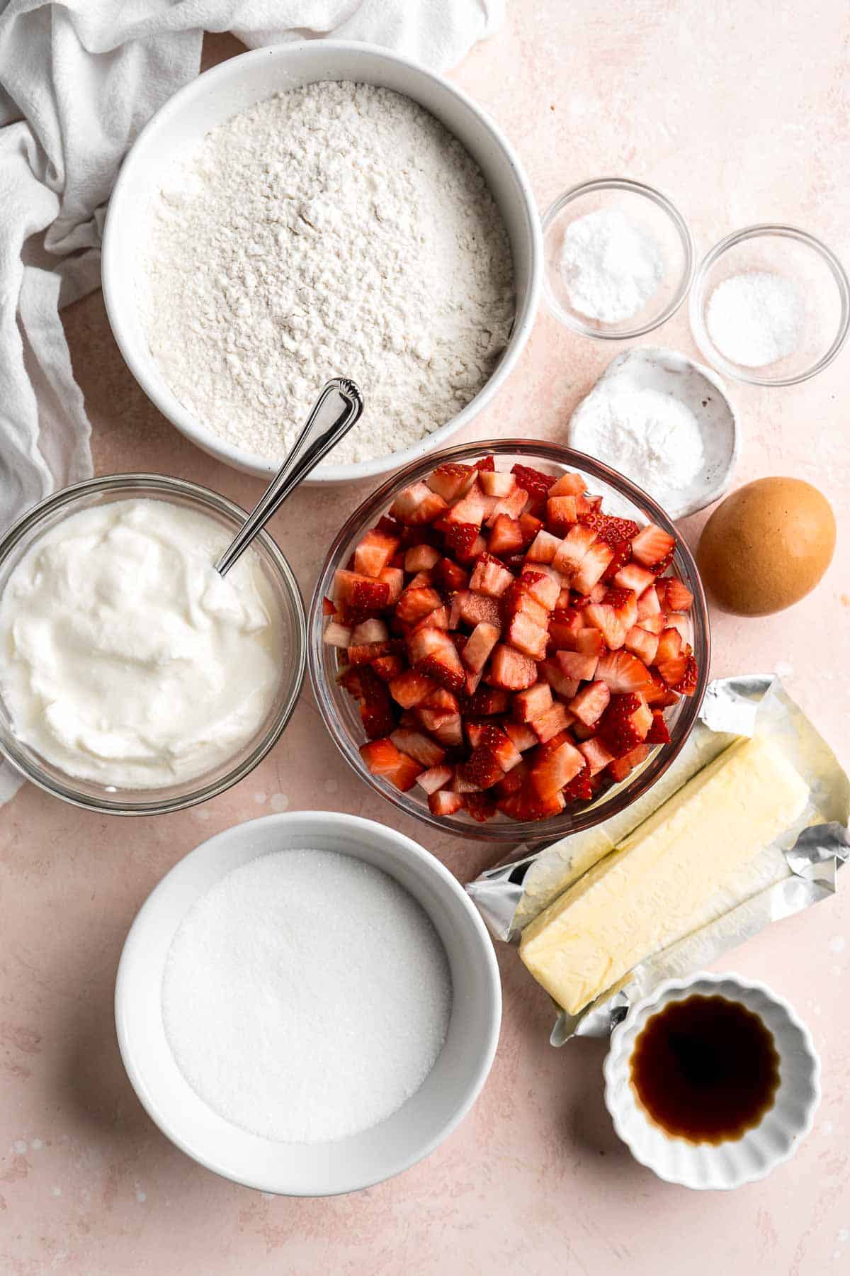 Strawberry Muffins are tender, fluffy, and delicious! They are golden-brown and crisp outside while moist and cake-like inside and loaded with strawberries. | aheadofthyme.com