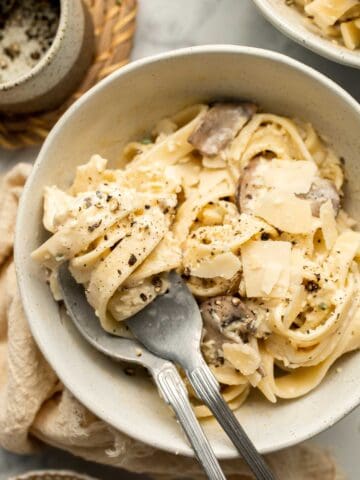 Creamy Mushroom Tagliatelle Pasta is a quick and easy, restaurant-worthy vegetarian dinner that is ready in just 30 minutes! Elevated comfort food at home. | aheadofthyme.com