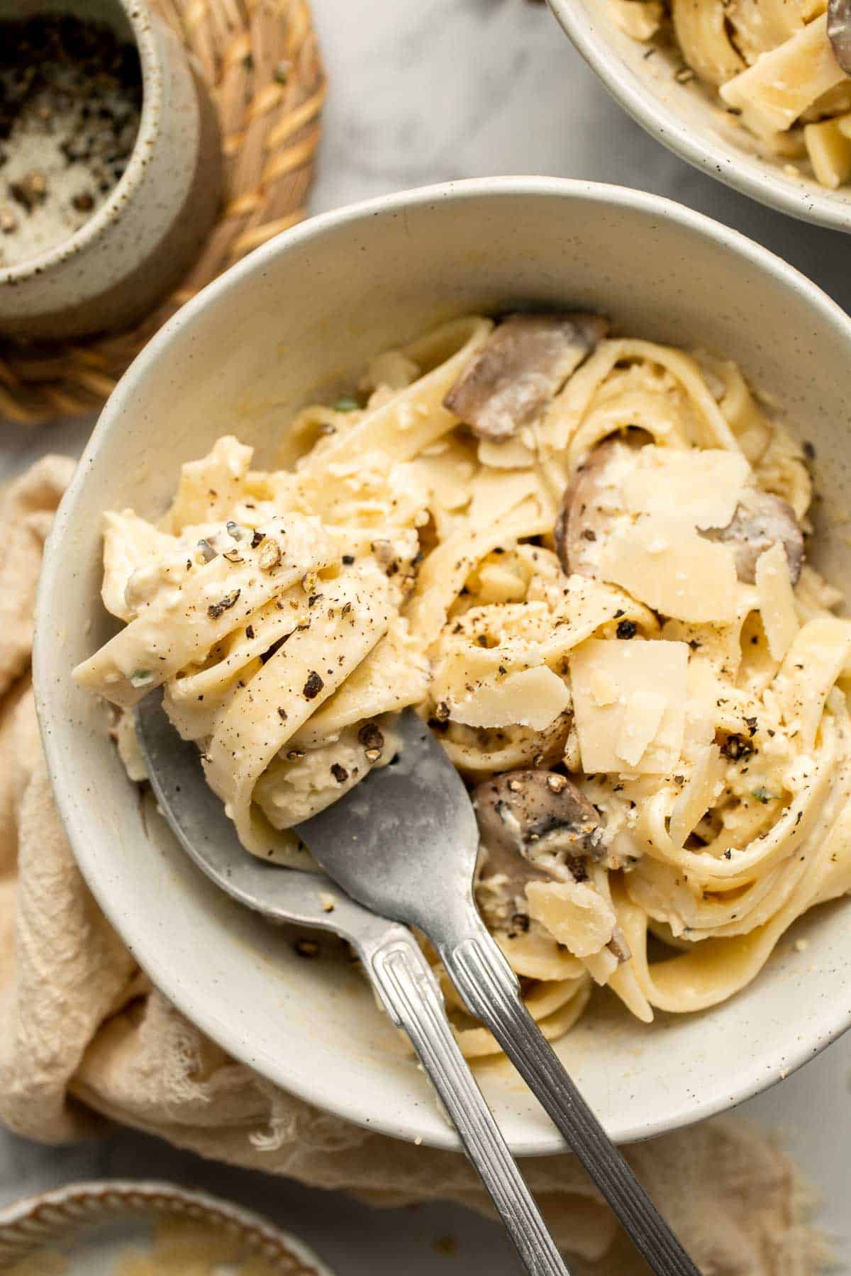 Creamy Mushroom Tagliatelle Pasta is a quick and easy, restaurant-worthy vegetarian dinner that is ready in just 30 minutes! Elevated comfort food at home. | aheadofthyme.com